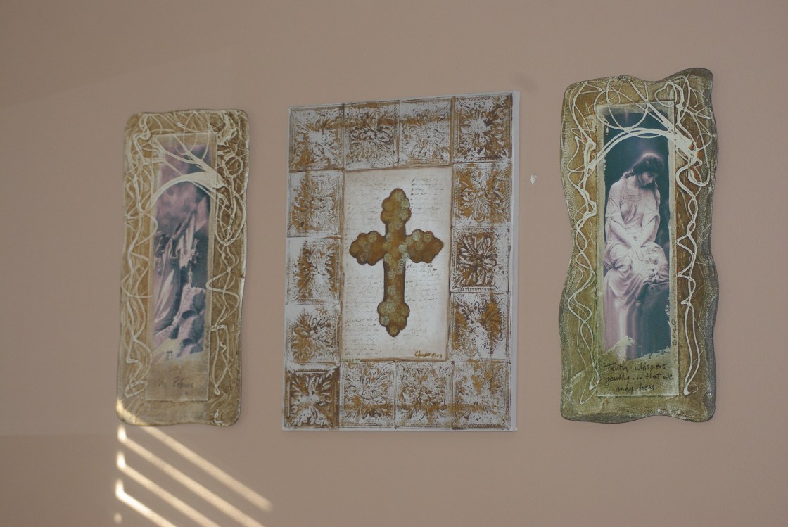 I purchased the two end pictures to go with the cross I painted years ago.  Makes a nice set.